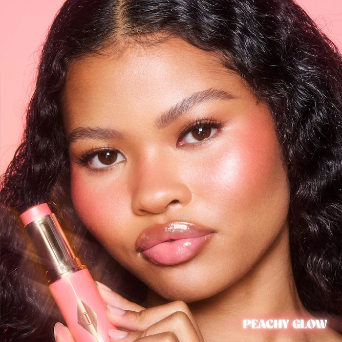 Charlotte Tilbury Unreal Lip + Cheek Glow Blush Stick in Peachy Glow